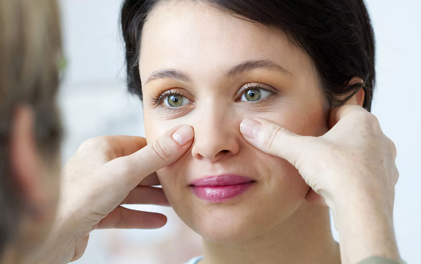 Good ENT specialist Singapore performing nasal exam