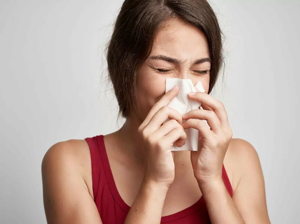 Woman with sinus headache needing ENT sinus specialist