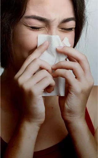 Woman with sinus headache needing ENT sinus specialist